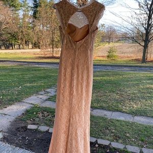 Formal dress worn once size 2. Mauve color